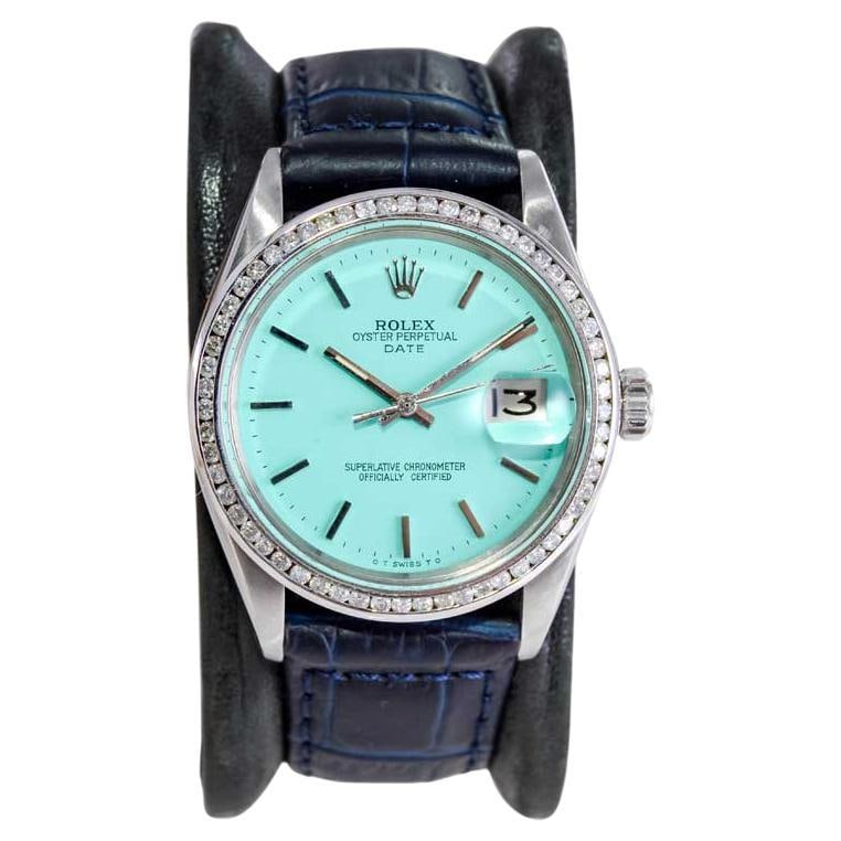 Rolex Steel Oyster Perpetual Date: Rolex Steel Oyster Perpetual Date with Custom Tiffany Blue Dial Early 1970s Brand: Rolex Style: Modernist Place of Origin: Switzerland Period: 1970-1979 Date of Manufacture: 1970s Condition: Excel