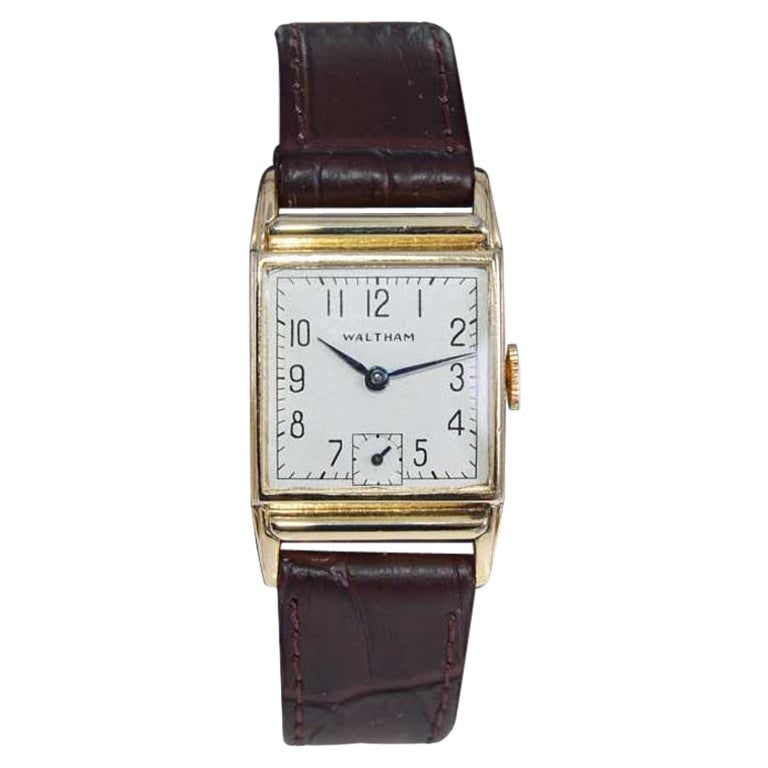 Waltham Gold Filled Art Deco: Waltham Gold Filled Art Deco Tank Style Watch, circa 1940's Brand: Waltham Movement: Manual Wind Style: Art Deco Place of Origin: United States Period: 1940-1949 Date of Manufacture: 1940's
