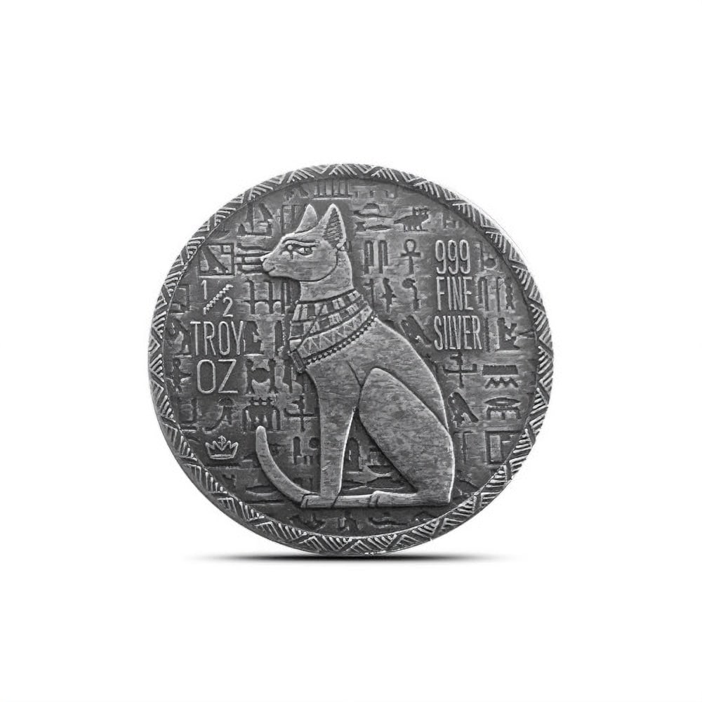 1/2 oz Monarch Egyptian Cat: 1/2 oz Monarch Egyptian Cat Goddess Bastet Silver Round (New) SKU no: RBJ1931702 Mint Mark: Not Shown Purity: .999 Manufacturer: Monarch Precious Metals Thickness: 2.3 mm Diameter: 30.2 mm