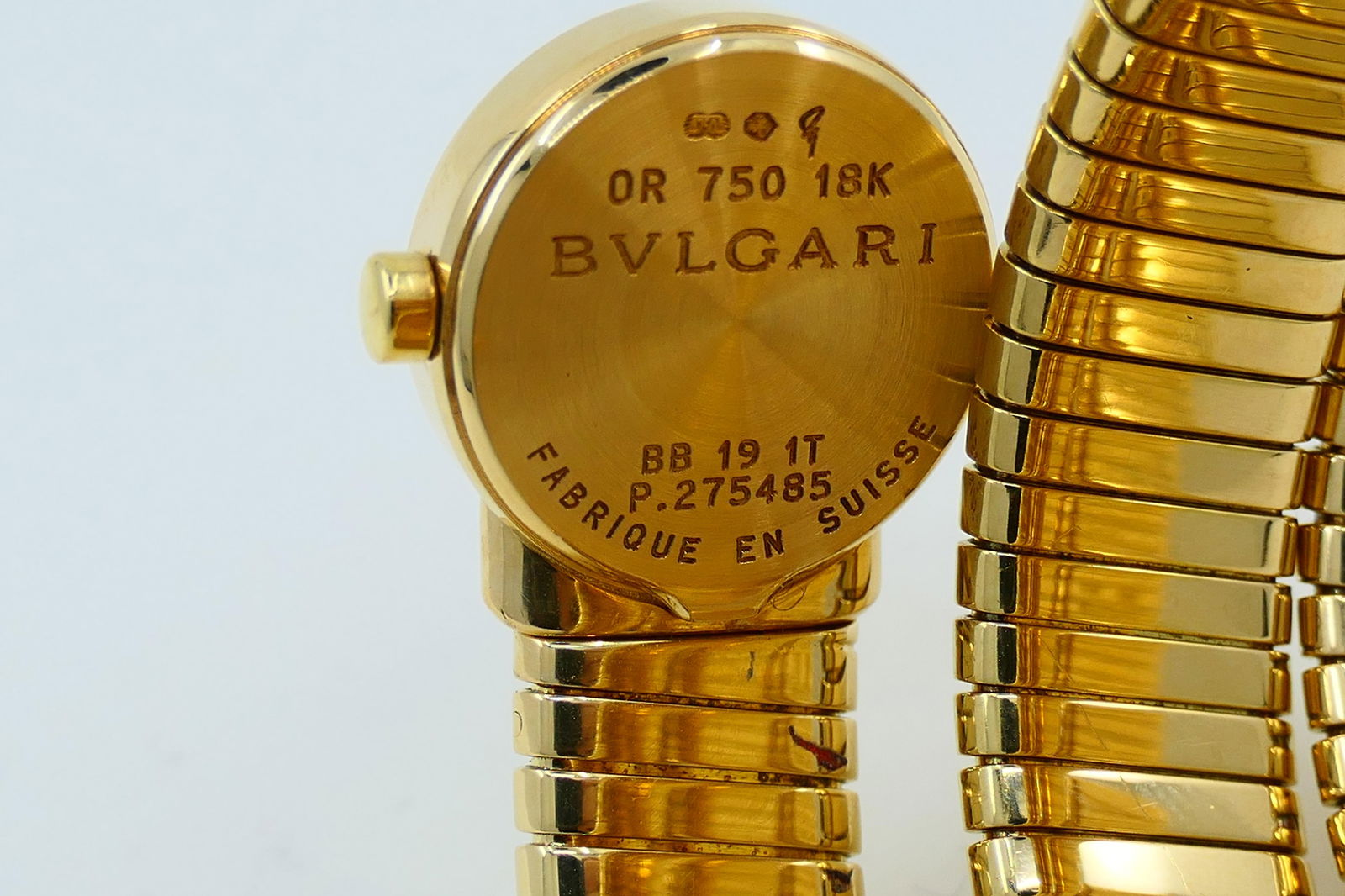 Bulgari Tubogas Gold Wrap Watch: Bulgari Tubogas Gold Wrap Watch BB19 Brand: Bulgari Case Material: Gold, 18k Gold, Yellow Gold Weight: 144.3 g Strap Material: Gold Case Shape: Round Movement: Quartz Case Dimensions: Hei