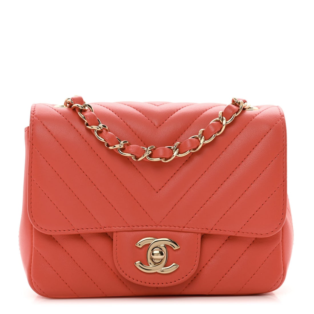 Chanel Lambskin Chevron Quilted Mini: Chanel Lambskin Chevron Quilted Mini Square Flap Coral Brand: CHANEL Condition: Very Good Condition Details: Exterior: Creases, imprints, faint corner wear, surface wear, Handle: Edge wear, Interior: