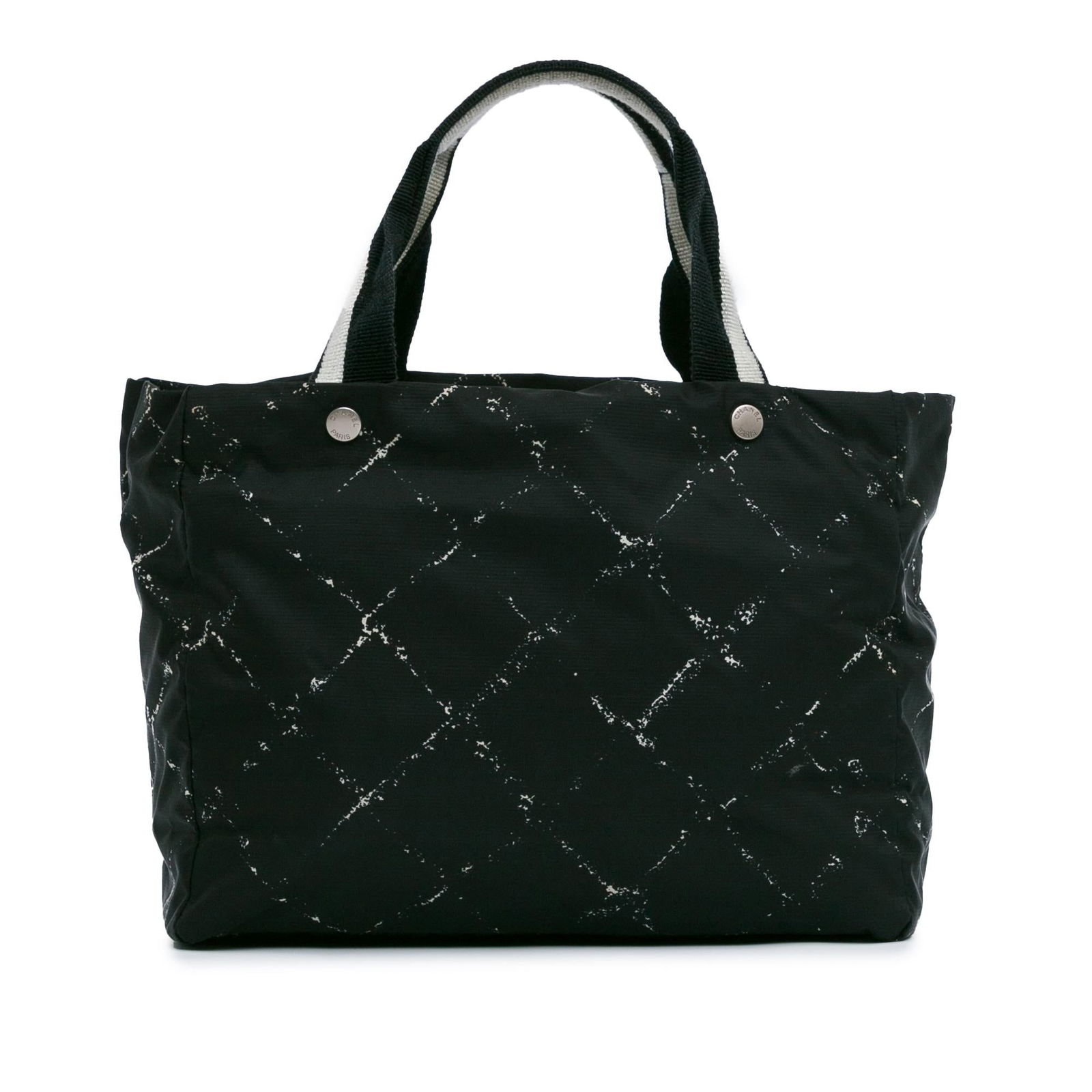 Chanel Printed Nylon Travel Line Tote: Chanel Printed Nylon Travel Line Tote Condition Quality: Exterior Front stained with Other. Exterior Back Creased. Exterior Back stained with Other. Exterior Bottom stained with Other. Exterior Handle
