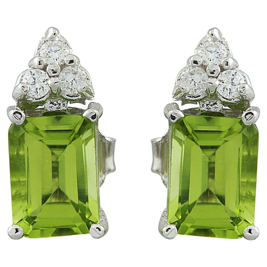 Natural Peridot Diamond Earrings In 14: Natural Peridot Diamond Earrings In 14 Karat White Gold 14k Gold, White Gold Stone: Diamond, Peridot Stone Cut: Emerald Cut Place of Origin: United States Period: 2010- Date of Manufacture: 2023