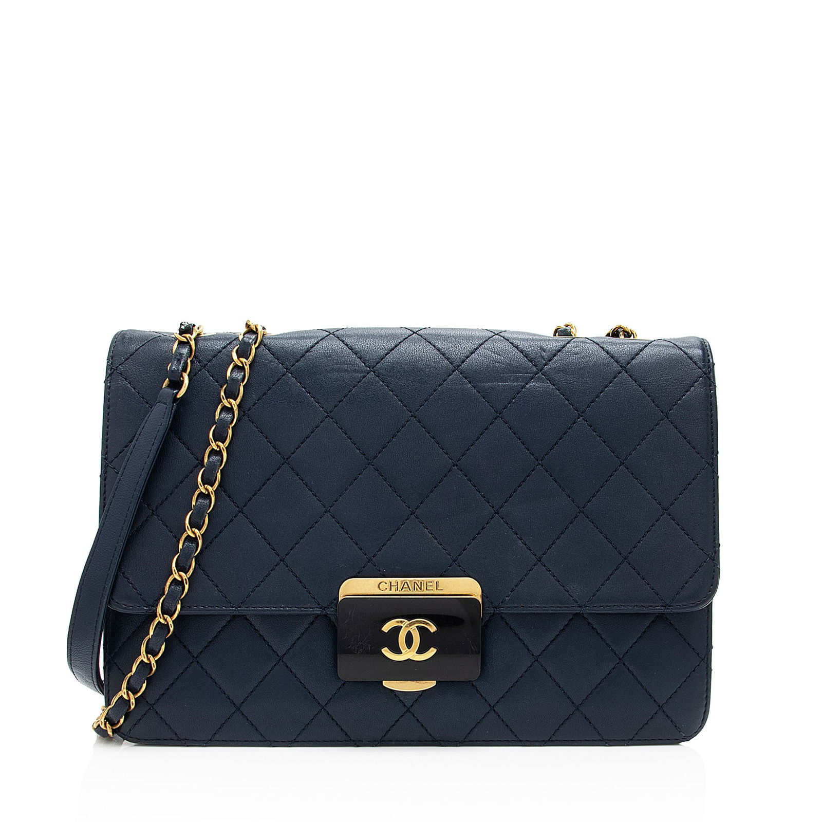Chanel Sheepskin Beauty Lock Medium Flap: Chanel Sheepskin Beauty Lock Medium Flap Bag Condition Quality: Moderate scuffs and imprints throughout exterior. Visible surface scratches to hardware. Scuffs and wear throughout interior flap. Light