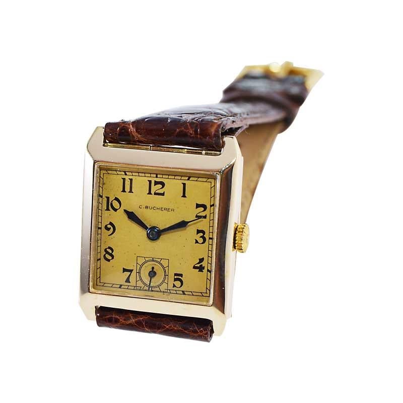 14Kt. Solid Gold Art Deco Tank: 14Kt. Solid Gold Art Deco Tank Watch with Original Dial circa 1930s by Bucherer Brand: Bucherer Movement: Manual Wind Style: Art Deco Place of Origin: Switzerland Period: 1930-1939 Date of Manufac