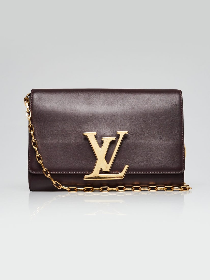 LOUIS VUITTON Quetsche Box Calfskin Leather: LOUIS VUITTON Quetsche Box Calfskin Leather Chain Louise GM Clutch Bag Overall Condition: Gently used Exterior Condition: Gently used Interior Condition: Gently used Designer: Louis Vuitton Material: