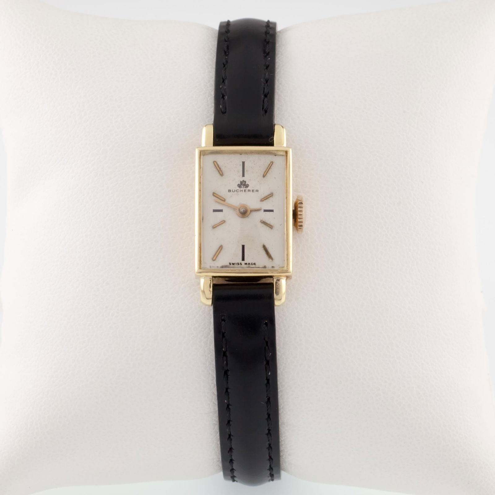 Bucherer 18k Yellow Gold Hand-Winding Watch: Bucherer 18k Yellow Gold Hand-Winding Watch w/ Leather Band Brand: Bucherer Case Material: 18k Gold, Yellow Gold Weight: 12.7 g Strap Material: Leather Case Shape: Rectangle Movement: Manual Wind