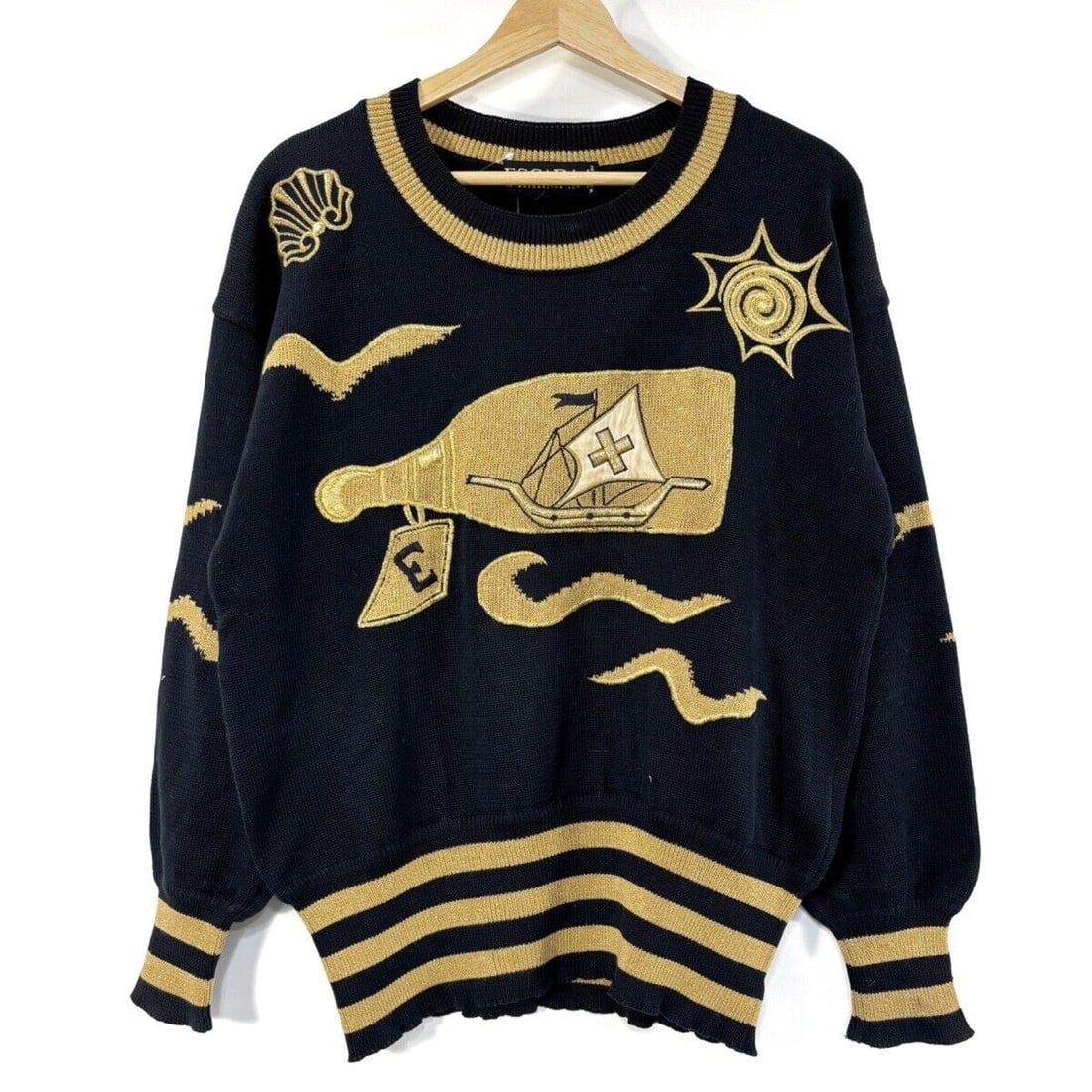 Auth ESCADA - Black Gold: Auth ESCADA - Black Gold Sweater Condition: Pre-owned Brand: ESCADA Style: Sweater Color: Black, Gold Material: Please see the photo of the quality tag Accessories: None ConditionRank: 4