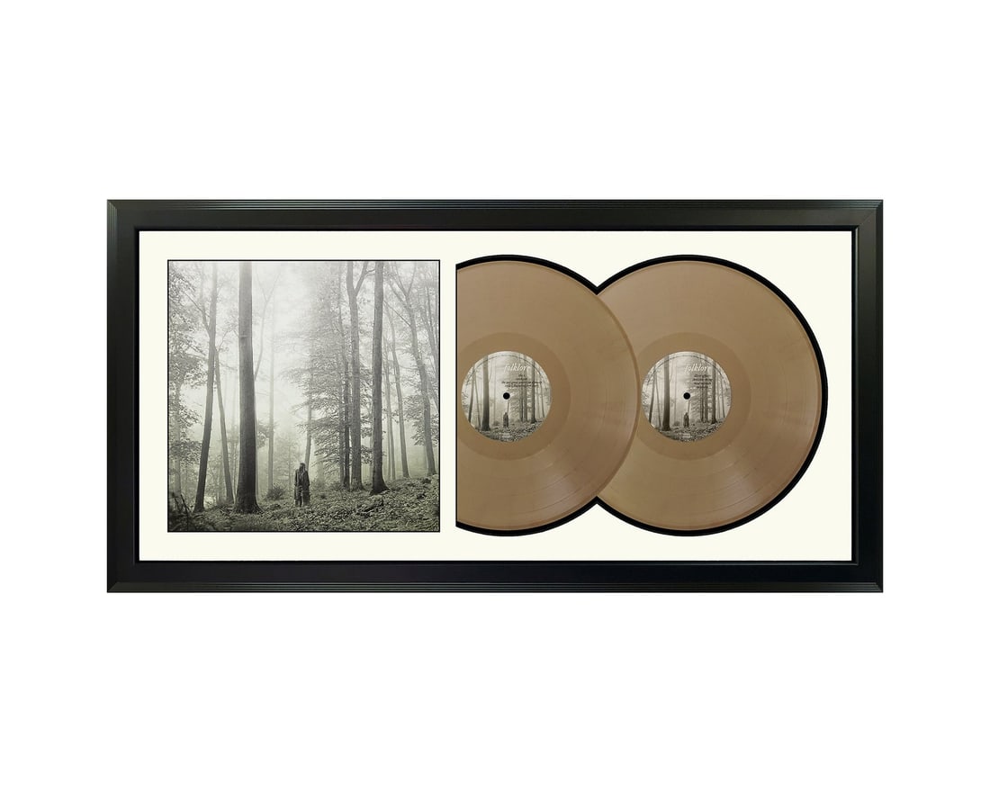 taylor swift folklore taylors version genuine: taylor swift folklore taylors version genuine double beige colored vinyl record & cover professionally framed 17.5 x 34.5 display with a black mat Celebrate your favorite band or artist with this orig