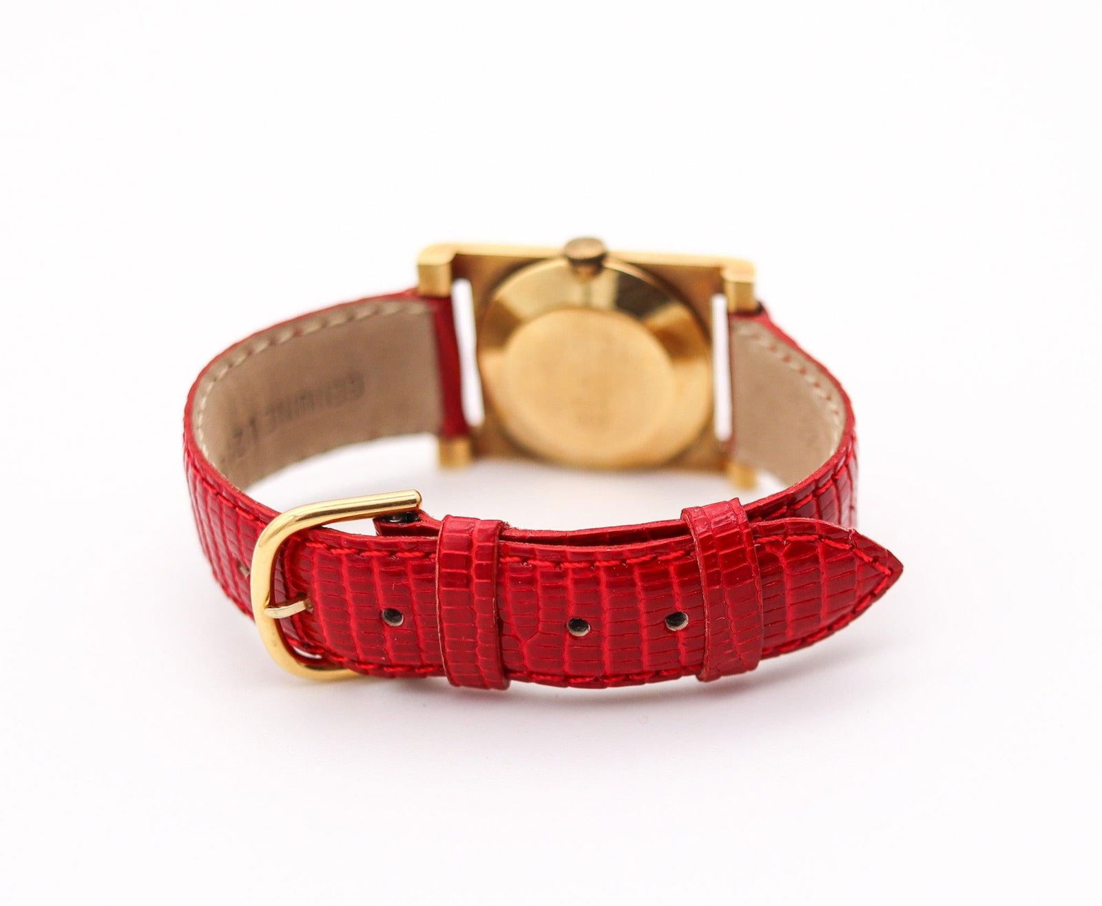 BUCHERER Swiss Wristwatch In 18Kt Yellow: BUCHERER Swiss Wristwatch In 18Kt Yellow Gold With Red Lizard Leather Strap Brand: Bucherer Case Material: Gold, Yellow Gold, 18k Gold Weight: 19.3 g Strap Material: Leather Case Shape: Rectangle