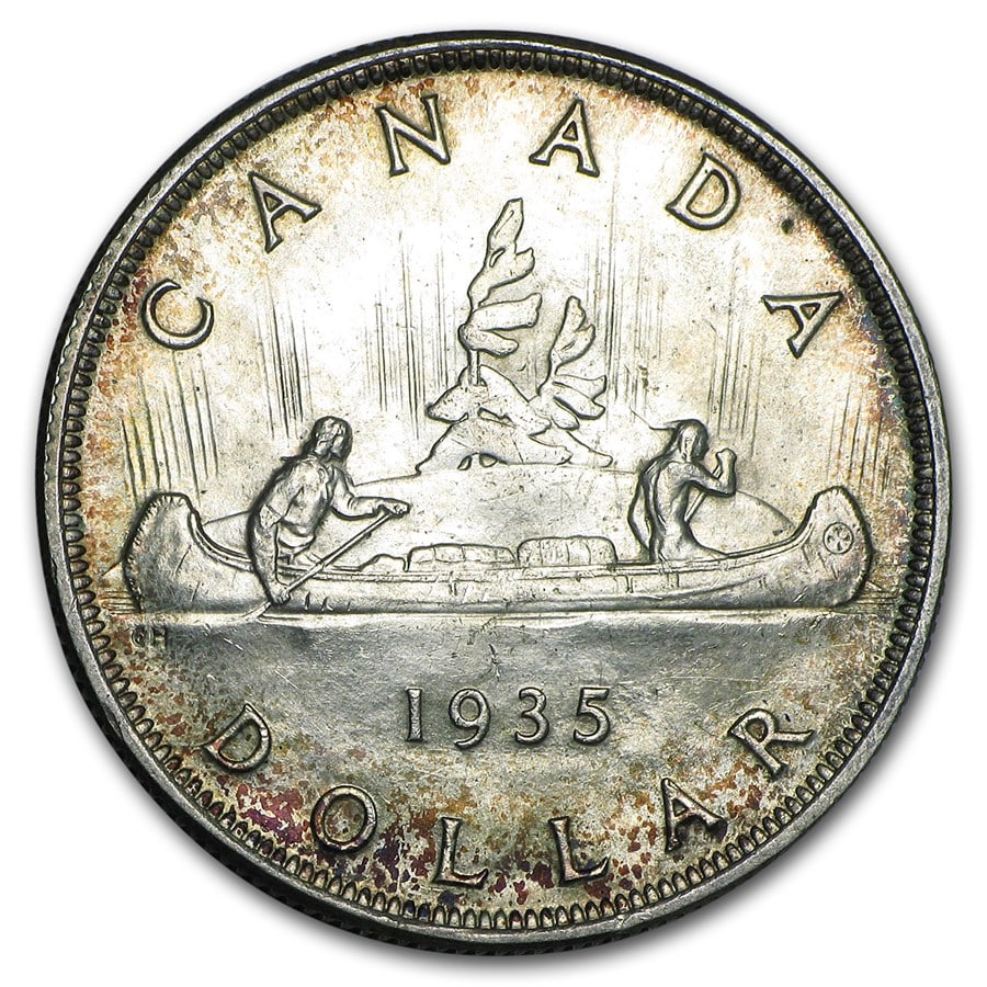 1935 Canada Silver Dollar George V: 1935 Canada Silver Dollar George V AU SKU no: RBJ56905 Year: 1935 Grade: Almost Unc Grade Service: None Denomination: $1.00 Dollar Mint Mark: RCM (Not Shown) Metal Content: 0.6 troy oz