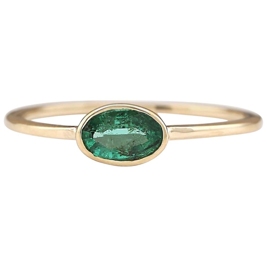 Emerald Ring 14K Yellow Gold: Natural Emerald Ring 14K Yellow Gold Ring Size: 7 US, Resizable Metal: 14k Gold, Yellow Gold Stone: Emerald Stone Cut: Oval Cut Weight: 0.5 ct Style: Modern Place of Origin: United States Period: 2010