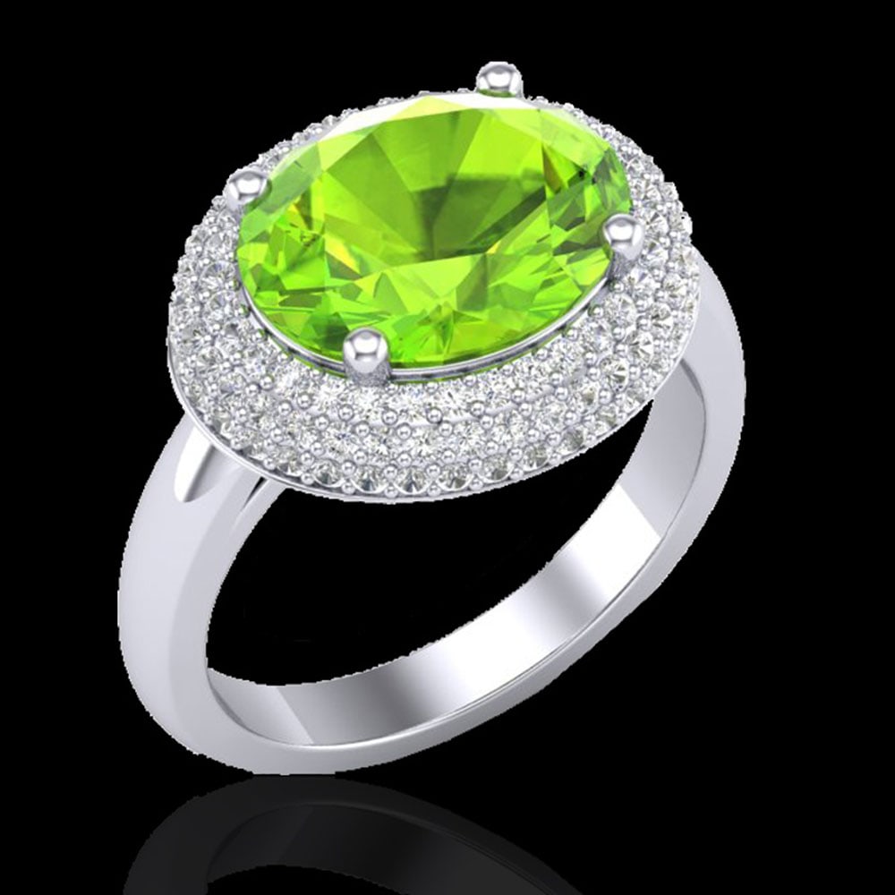 4.50 ctw Peridot & Micro Pave VS/SI Diamond Ring 18k White Gold: 4.50 ctw Peridot & Micro Pave VS/SI Diamond Ring 18k White Gold Item: Peridot Ring Total Gem weight: 4.5 carats Metal: Solid 18k White Gold Gold Product Weight: Approx. 4.8 grams Jewelry Note: