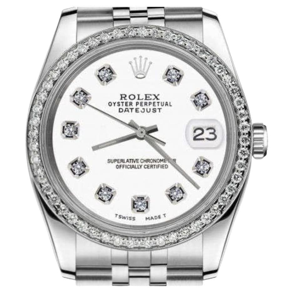 Rolex Datejust 69173 with Custom Diamond: Rolex Datejust 69173 with Custom Diamond Bezel SS White Color Dial with Diamonds Rolex 26mm Datejust With custom Diamond bezel SS White Color Dial with Diamonds Deployment buckle 69173 Brand: Rolex De