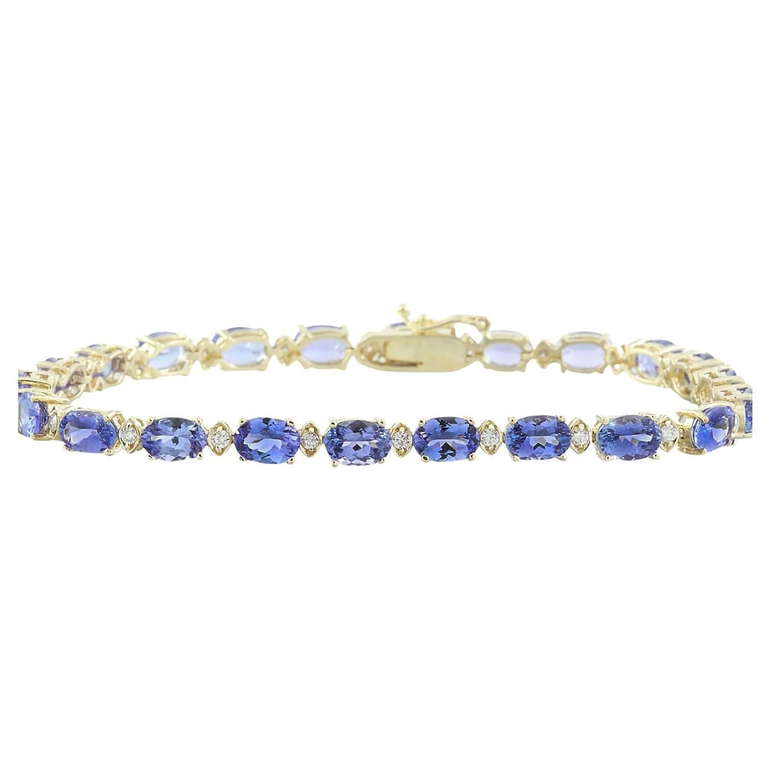Natural Tanzanite Diamond Bracelet in 18K Solid Yellow Gold: Natural Tanzanite Diamond Bracelet in 18K Solid Yellow Gold 13.45 Carat Natural Tanzanite 18K Solid Yellow Gold Diamond Bracelet Stamped: 18K Total Bracelet Weight: 8.8 Grams Bracelet Length: 7 Inches