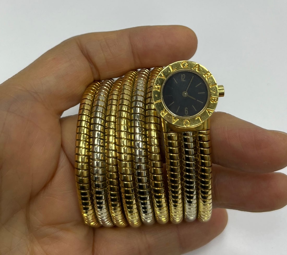 Bulgari Tubogas White Yellow Gold Wrap: Bulgari Tubogas White Yellow Gold Wrap Bracelet Watch BB191T Creator: Bulgari Case Material: 18k Gold Weight: 142.2 g Strap Material: Gold, White Gold Case Shape: Round Movement: Quartz C