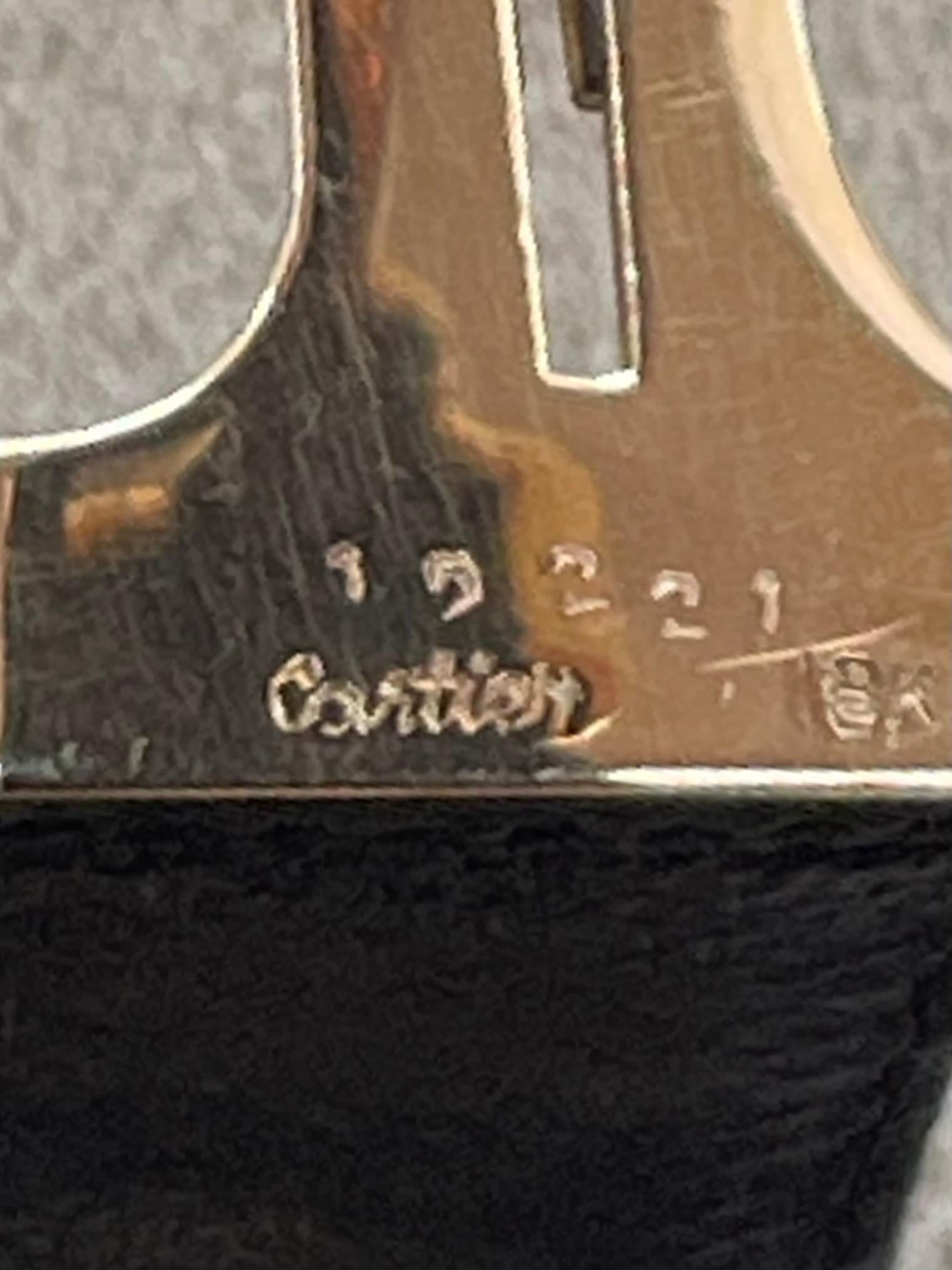 Van Cleef & Arpels Gold Wristwatch: Van Cleef & Arpels Gold Wristwatch with Cartier Strap, 18Kt, 31.6 Grams Creator: Van Cleef & Arpels Weight: 31.6 g Strap Material: Leather Case Shape: Rectangle Case Dimensions: Height: 1.07 in (27 mm