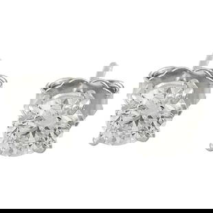 Elegant 0.80 Carat Natural Diamond Stud Earrings In 18K White Gold: Elegant 0.80 Carat Natural Diamond Stud Earrings In 18K White Gold Introducing our elegant 0.80 Carat Natural Diamond Stud Earrings in 18K White Gold. Stamped with 18K authenticity, these earrings