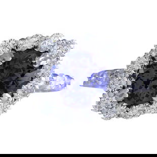 Natural Tanzanite Diamond Ring In 18K White Gold: Natural Tanzanite Diamond Ring In 18K White Gold Stamped: 18K White Gold Total Ring Weight: 4.5 Grams Total Natural Tanzanite Weight is 2.70 Carat (Measures: 8.50x8.50 mm) Color: Blue 
