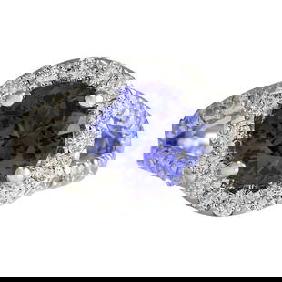 Natural Tanzanite Diamond Ring In 14K White Gold: Natural Tanzanite Diamond Ring In 14K White Gold 3.86 Carat Natural Tanzanite 14K White Gold Diamond Ring Stamped: 14K White Gold Total Ring Weight: 7.5 Grams Total Natural Tanzanite
