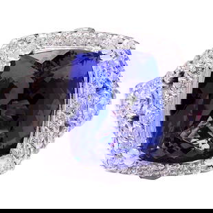 Dazzling Tanzanite Diamond Ring In 18K Solid White Gold: Dazzling Tanzanite Diamond Ring In 18K Solid White Gold Introducing our stunning 7.80 Carat Tanzanite 18K Solid White Gold Diamond Ring. Crafted from luxurious 18K White Gold, this ring features a