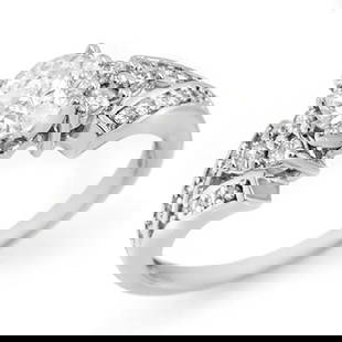 1.42 ctw Certified VS/SI Diamond Ring 18k White Gold: 1.42 ctw Certified VS/SI Diamond Ring 18k White Gold Item: Diamond RingTotal Gem weight: 1.42 carats Metal: Solid 18k White Gold Gold Product Weight: Approx. 5.2 grams Jewelry Note: Ring Size