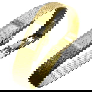 Gubelin Ladies 18 Karat Texture 1970s: Gubelin Ladies 18 Karat Texture 1970s Swiss Watch Mechanical Creator: E. Gubelin, clock Metal: 18k Gold Weight: 26.9 g Dimensions: Width: 0.5 in (12.7 mm) Length: 6 in (152.4 mm) Style: Modern Pla