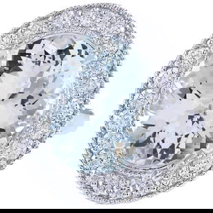 Aquamarine Diamond Ring In 18K White Gold: Aquamarine Diamond Ring In 18K White Gold 7.25 Carat Natural Aquamarine 18K White Gold Diamond Ring Stamped: 18K White Gold Total Ring Weight: 7.8 Grams Total Natural Aquamarine Weight is