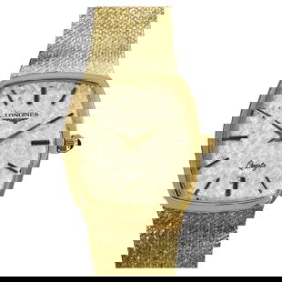 Longines Yellow Gold Wristwatch, Circa 1980s: Longines Yellow Gold Wristwatch, Circa 1980s Creator: Longines Case Material: Gold, 14k Gold, Yellow Gold Stone: Blue Sapphire Stone Cut: Cabochon Weight: 47.6 g Case Shape: Round Place o