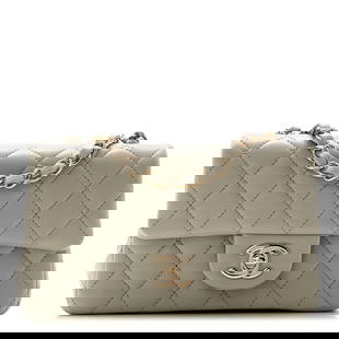 Chanel Lambskin Quilted Mini Rectangular Flap: Chanel Lambskin Quilted Mini Rectangular Flap Grey Brand: CHANEL Condition: Excellent Condition Details: Exterior: Creases, Interior: Creases, scuffs, Hardware: Protective plastic sticker(s)
