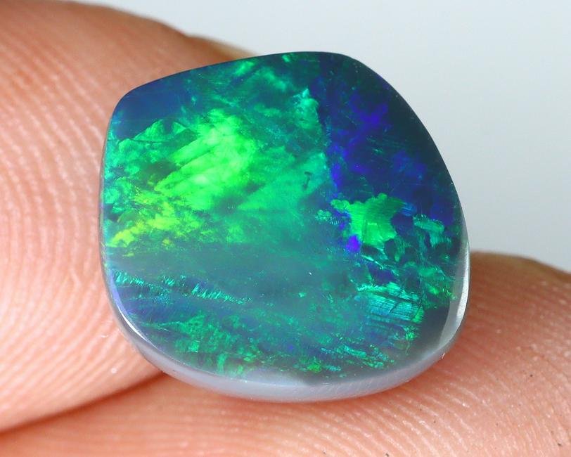 3.39Ct Australian Solid Lightning Ridge Black Opal 10.6x10.3x4.1mm (1 of 4)