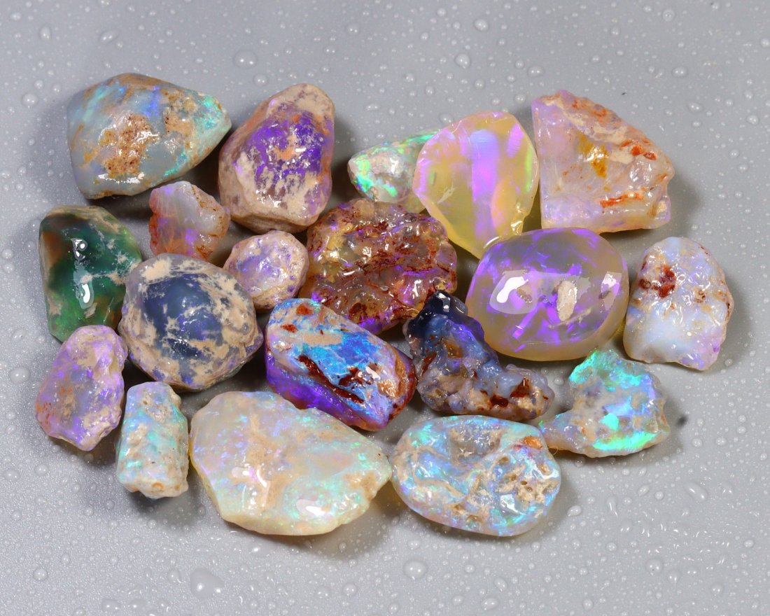 110Ct Group of 19 Pieces Fossilized Crystal Opal Rough from Lightning Ridge: Thousand Planet Auction House Treasure Auction Day, all major kinds of Mineral, you will find in today's auctions. Join us and add our auction into your calendar. Today auction including Artifacts, Mi