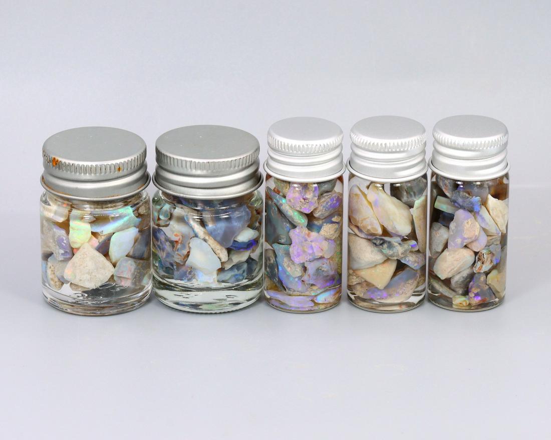 277Ct Group of 5 Australian Lightning Ridge Black Opal Rough Jars (1 of 2)