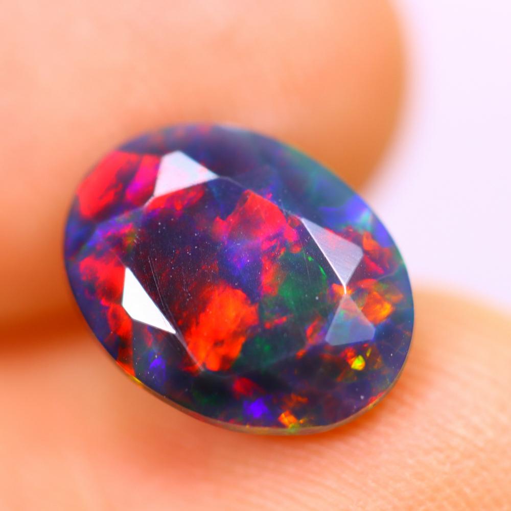 1.83Ct Welo Black Opal Polished - Ethiopian Opal - Oval Faceted: Thousand Planet Auction House Welcome to our auction house, today auction brought to you by Leharlequin Co., Ltd based in Bangkok, Thailand specialize in all kinds of opal and color gemstone both in m