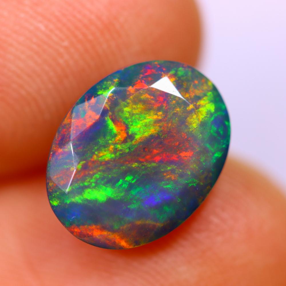 2.24Ct Welo Black Opal Polished - Ethiopian Opal - Oval Faceted: Thousand Planet Auction House Welcome to our auction house, today auction brought to you by Leharlequin Co., Ltd based in Bangkok, Thailand specialize in all kinds of opal and color gemstone both in m