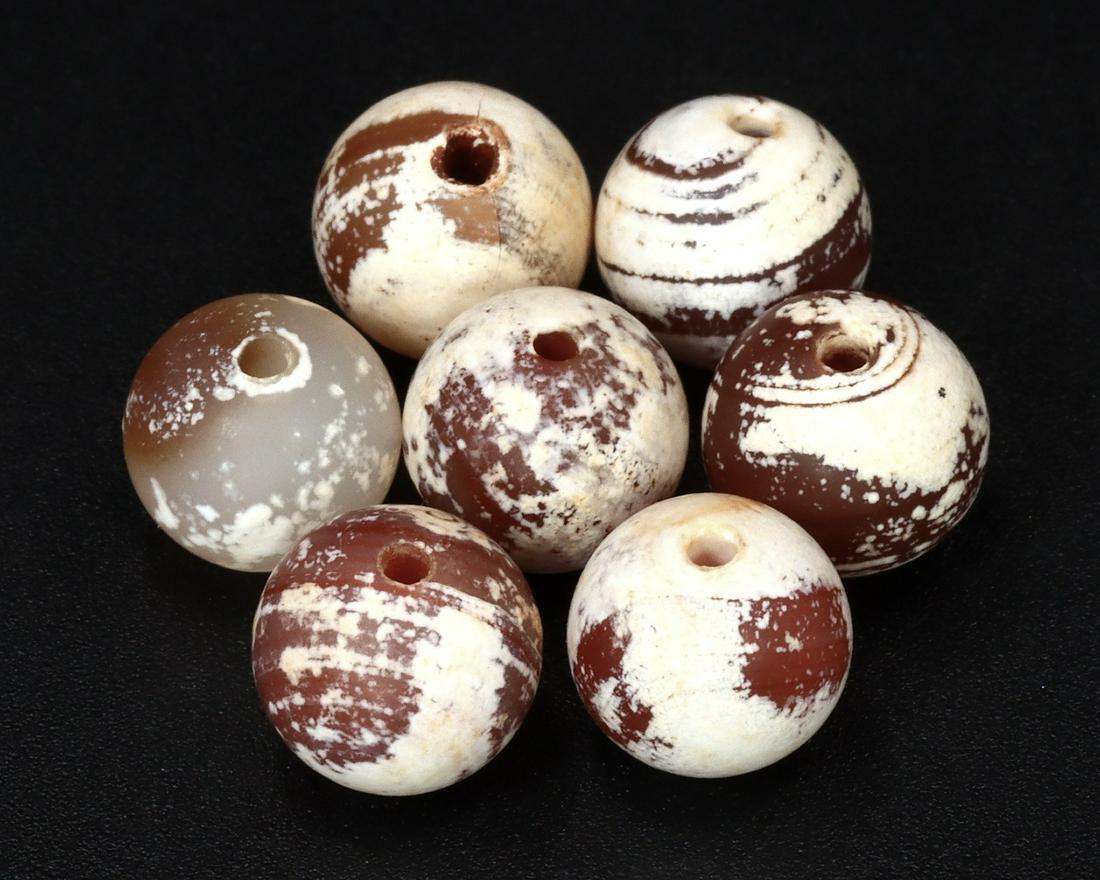 Ancient Greco-Bactrian Hidden Treasure Ancient Red Carnelian Bead: Ancient Greco-Bactrian Hidden Treasure Ancient Red Carnelian Bead Cultures/Periods: Circa Period 256BC-120BC Dimension: 8.2mm Findspot: Afghanistan Provenance: Private Collection to Nepal family. Acqu