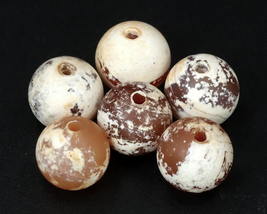 Ancient Greco-Bactrian Hidden Treasure Ancient Red Carnelian Bead: Ancient Greco-Bactrian Hidden Treasure Ancient Red Carnelian Bead Cultures/Periods: Circa Period 256BC-120BC Dimension: 8.2mm Findspot: Afghanistan Provenance: Private Collection to Nepal family. Acqu