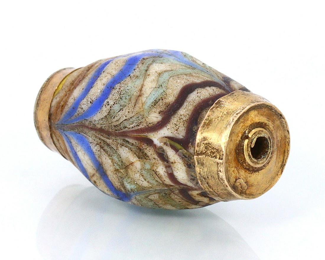 An Ancient Hellenistic to Byzantine Period Trailed Roman Glass Bead (1 of 4)
