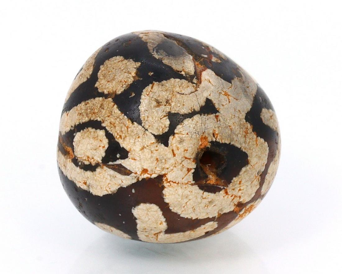 An Antique Western Asiatic Diamond Eye Decorated Etched Carnelian dZi Bead: Dimension: 11x10mm New - Produced within the last 20 years Vintage - Over 20 years of age but less than 100 years of age Antique - Over 100 years of age but less than 500 years of age Ancient - Over 5