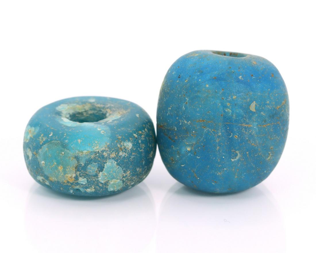 Two Ancient Monochrome Blue Glass Beads Late Berenike Harbor Temenos Ancient Egyptian Beads: Dimension: 17.6x17mm New - Produced within the last 20 years Vintage - Over 20 years of age but less than 100 years of age Antique - Over 100 years of age but less than 500 years of age Ancient - Over