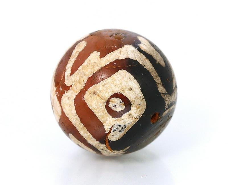 An Ancient Antique Asiatic Diamond Eye Decorated Tibetan Etched Carnelian dZi Bead: Dimension: 11x11mm New - Produced within the last 20 years Vintage - Over 20 years of age but less than 100 years of age Antique - Over 100 years of age but less than 500 years of age Ancient - Over 5