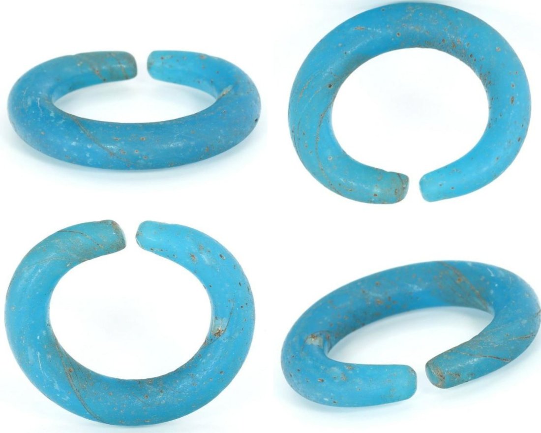 An Ancient Western Asiatic Ancient Egyptian Blue Glass Earring Art Glass Paperweights: Dimension: 34x29x6mm Thousand Planet Auction House Season 2 Asian Treasure Hunt Auction, auction including Abstract Oil Painting, Sculptures & Carvings, Statues & Statuettes, Bust Carving, Signet Ring