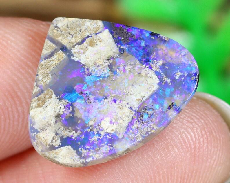 Australian Lightning Ridge Mine Loose Black Opal Dark Solid Opal Cabochon: Dimension: 15.4x13.3x3.6mm Thousand Planet Auction House Season 2 Asian Treasure Hunt Auction, auction including Abstract Oil Painting, Sculptures & Carvings, Statues & Statuettes, Bust Carving, Signe