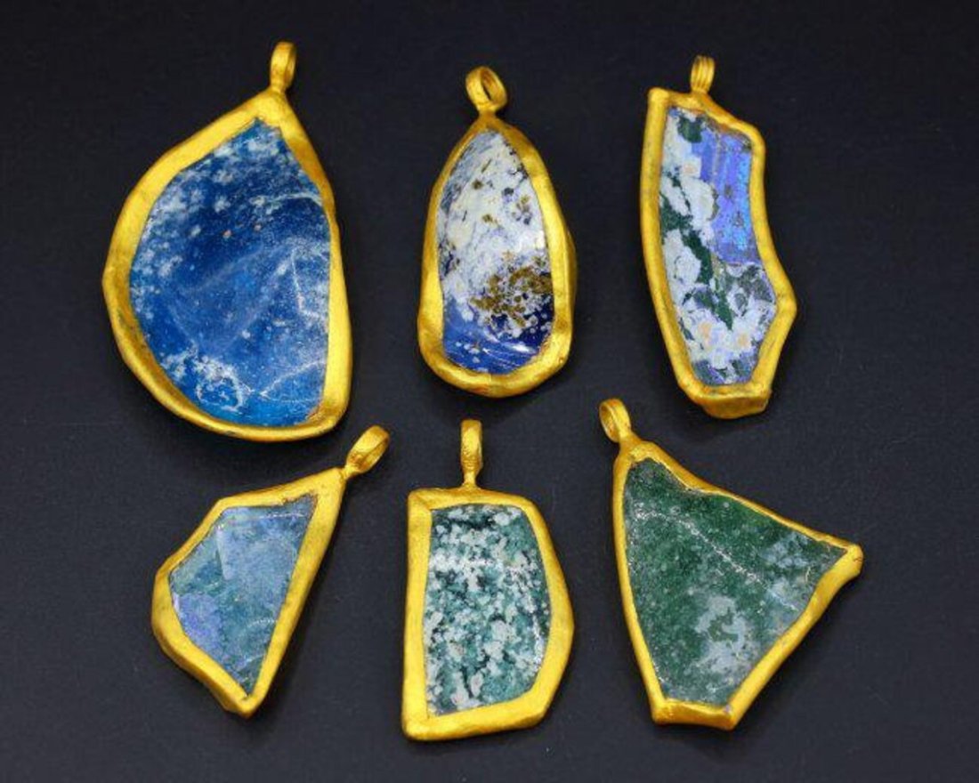 Six Ancient surface iridescent Roman Glass Slags Lockets Pendants with Patina 1st-5th Century AD: Dimension: 2 1/8-3 9/64inches Thousand Planet Auction House Season 2 Asian Treasure Hunt Auction, auction including Abstract Oil Painting, Sculptures & Carvings, Statues & Statuettes, Bust Carving, Si
