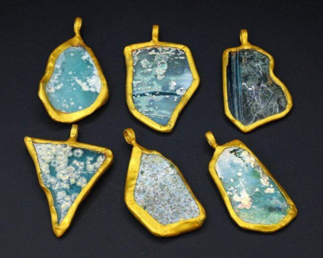 Six Ancient surface iridescent Roman Glass Slags Lockets Pendants with Patina 1st-5th Century AD: Dimension: 2 1/8-2 9/32inches Thousand Planet Auction House Season 2 Asian Treasure Hunt Auction, auction including Abstract Oil Painting, Sculptures & Carvings, Statues & Statuettes, Bust Carving, Si
