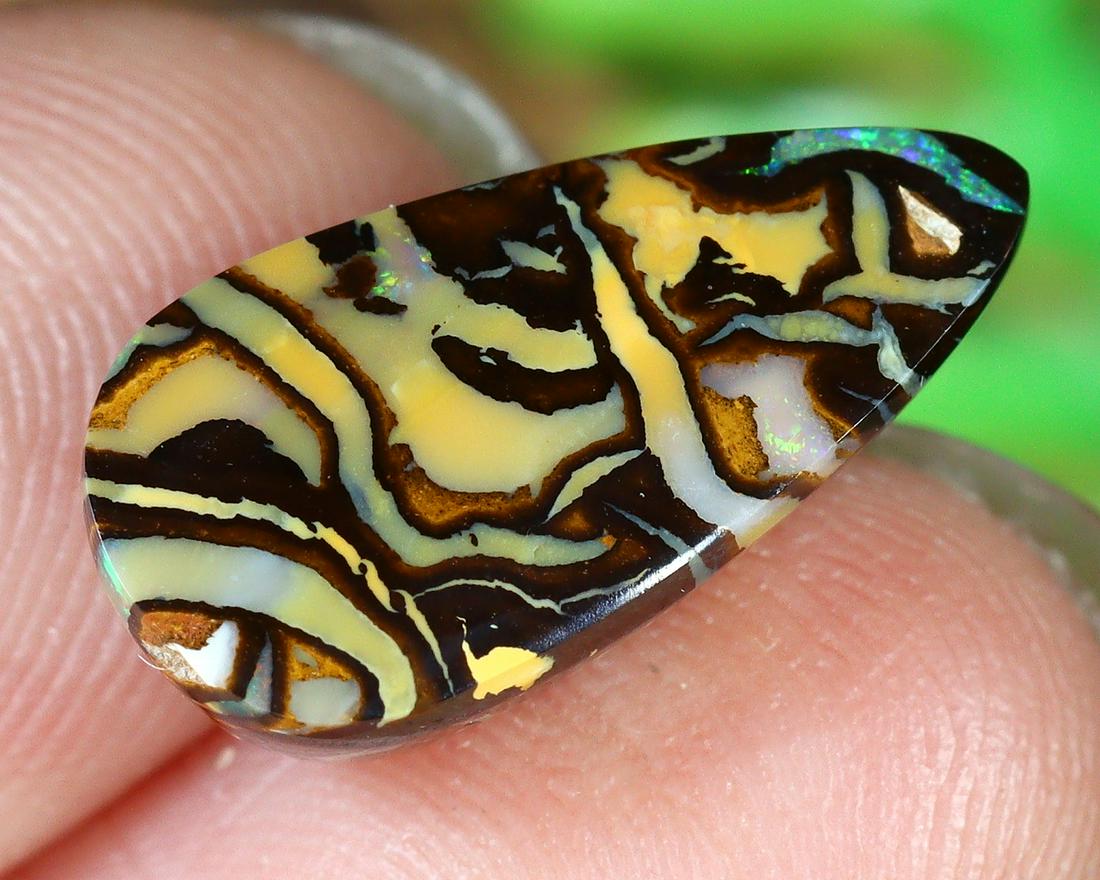 3.8Ct Natural Loose Australian Koroit Yowah Boulder Opal Cabochon: Dimension: 14.7x7.6mm Natural History of Australian Opal & Mineral Auction by Thousand Planet Auction House featuring the beauty of Boulder Opal art in cabochon cutting and rough, well known Australia