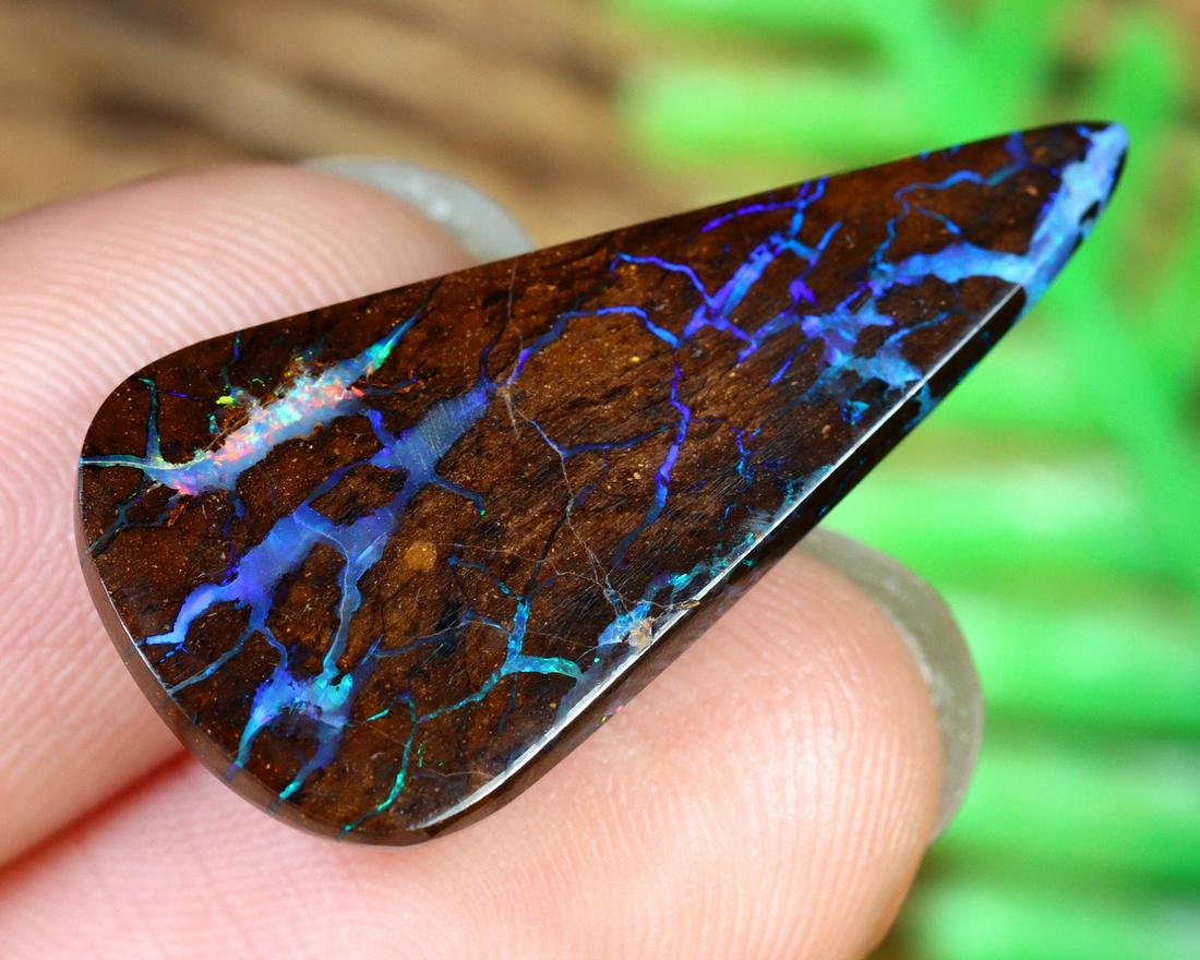 12Ct Natural Loose Australian Koroit Yowah Boulder Opal Cabochon: Dimension: 26x13mm Natural History of Australian Opal & Mineral Auction by Thousand Planet Auction House featuring the beauty of Boulder Opal art in cabochon cutting and rough, well known Australian L