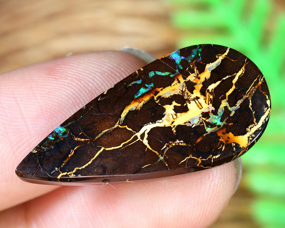 19.8Ct Natural Loose Australian Koroit Yowah Boulder Opal Cabochon: Dimension: 28.3x13.6mm Natural History of Australian Opal & Mineral Auction by Thousand Planet Auction House featuring the beauty of Boulder Opal art in cabochon cutting and rough, well known Australi