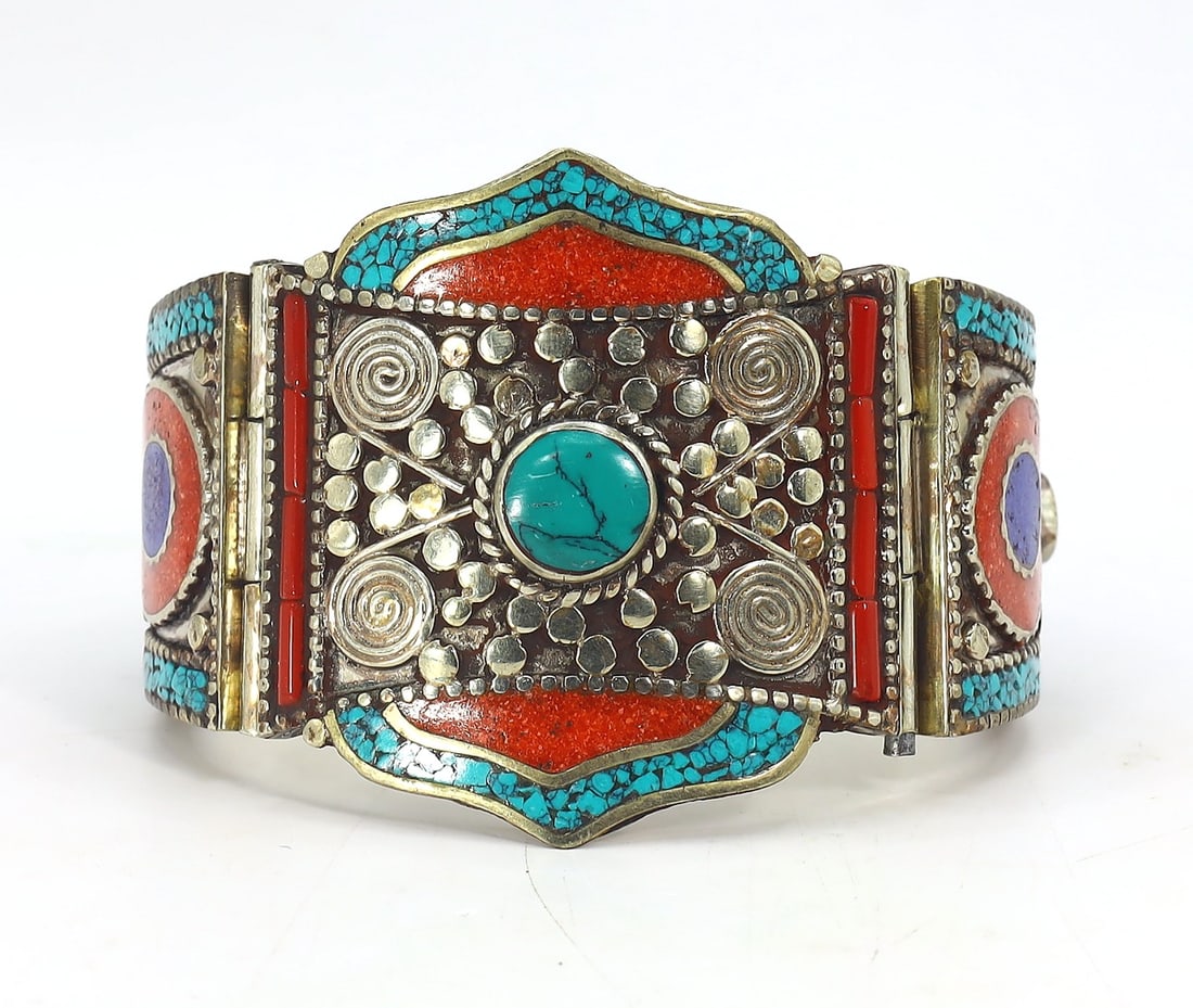 Vintage Tibetan Nepalese Cuff Bangle With Turquoise Coral And Lapis Lazuli Stone: 7x7.5cm Weight: 161 grams (Before Packing) Thousand Planet Auction House Season 4: Ten2Go August Collection Auction. A bargain hunter's, fixer-upper's, and pack-rat's dream come true! Our Ten2Go "ware