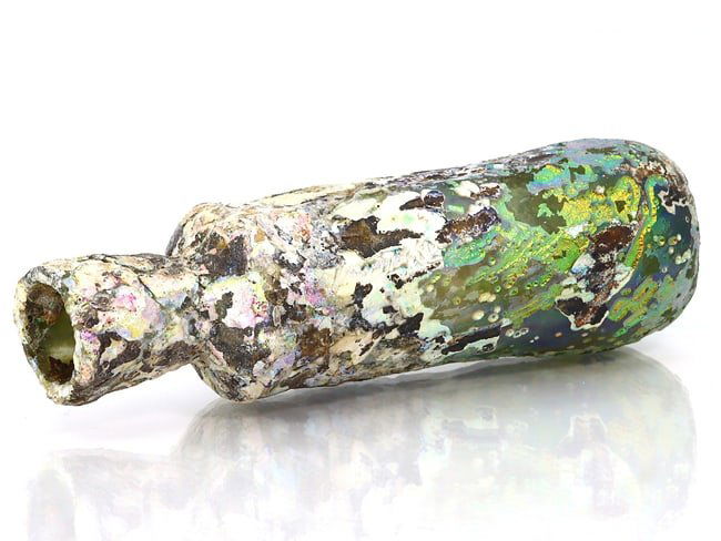 An Ancient Western Asiatic Roman Glass Unguentarium Flask Vessel Art Antique: 3 5/32 inches Weight: 29 grams (Before Packing) Thousand Planet Auction House Season 4: Ten2Go August Collection Auction. A bargain hunter's, fixer-upper's, and pack-rat's dream come true! Our Ten2Go